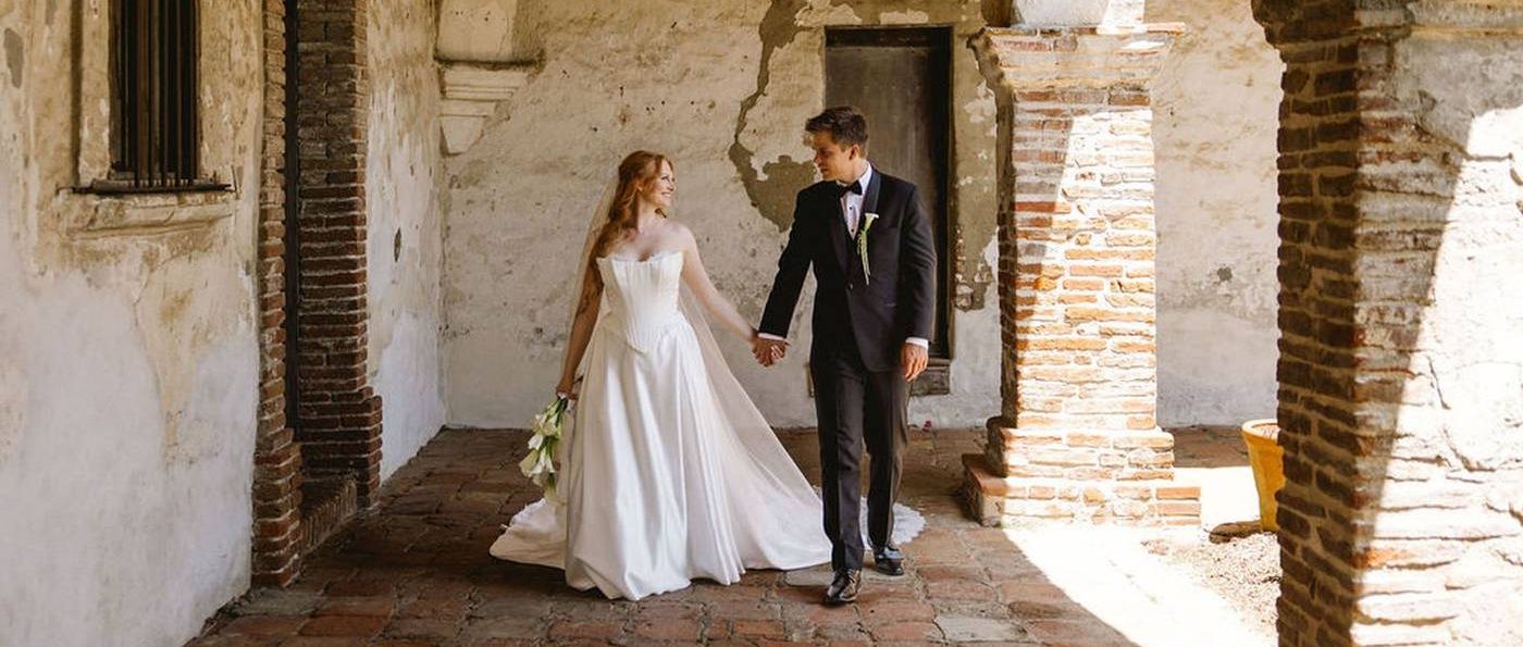 Bride and groom with bridal makeup by Xander Tang at Franciscan Gardens, San Juan Capistrano